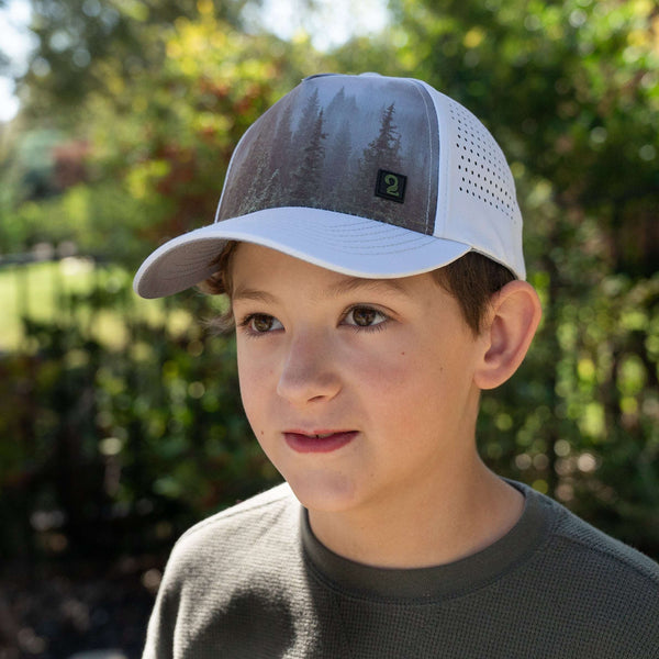 boy trucker hat with high ponytail opening, water-resistant, breathable performance mountain hat for kids age 4-10