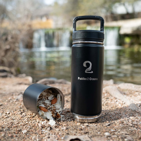Black kids water bottle with 26oz capacity, insulated double-wall stainless steel and bottom storage compartment for snacks or essentials