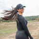 Woman wearing Puddles2Oceans ponytail hatWoman wearing Puddles2Oceans ponytail hat