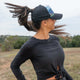 Female trucker hat with high ponytail opening worn outdoors for adventures from mountain to sea